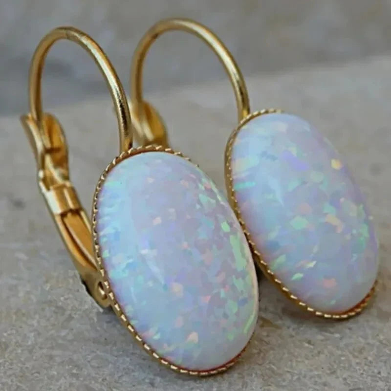 Pendientes vintage de opal blanco y dorados