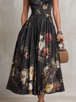 Esmeralda | Elegante Vestido Midi Plisado de Satén Negro con Estampado Floral y Cuello con Abertura