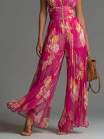 Yara | Mono de Gasa Fucsia con Estampado Floral, Sin Mangas, Cierre de Cremallera, Detalle Plisado y Perneras Anchas
