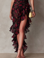Ilara | Elegante Vestido Negro y Rojo con Estampado Floral y Volantes en el Bajo