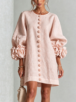 Vestido mini floral rosa con botones y mangas florales llamativas