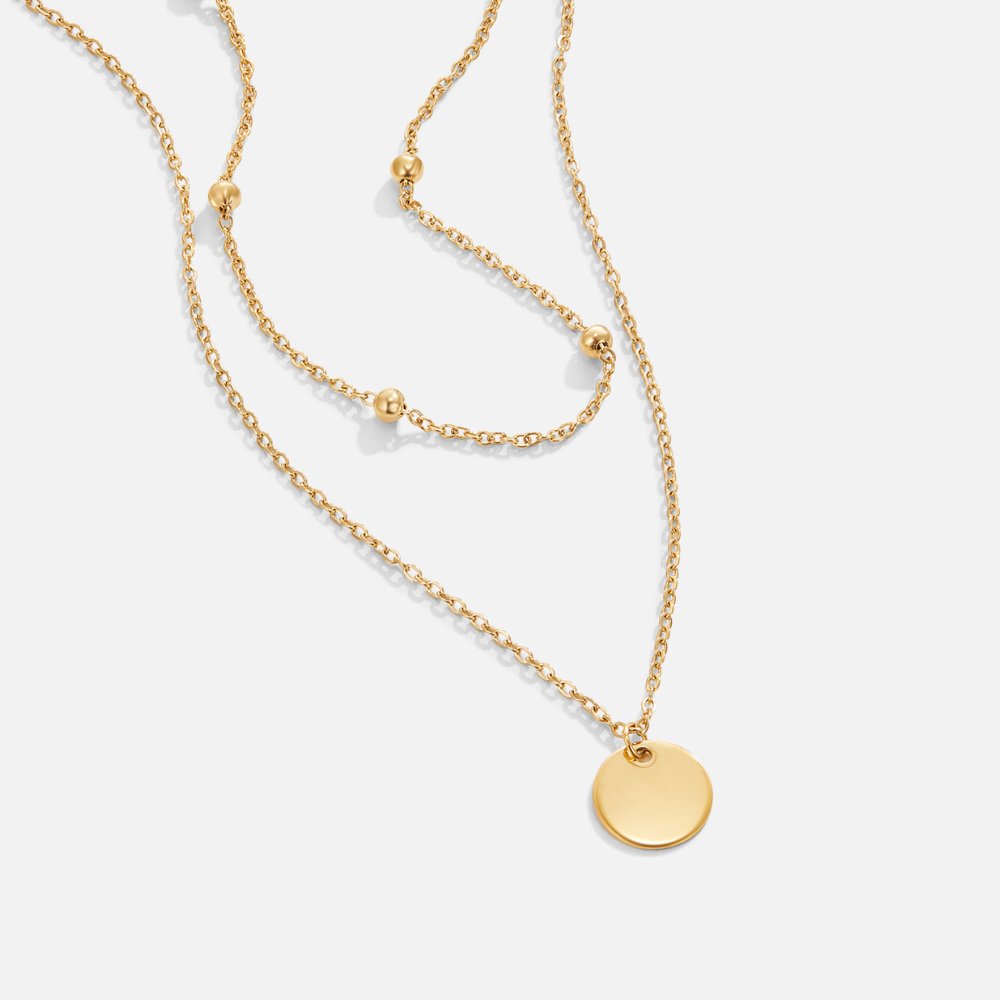 Collar con disco laminado