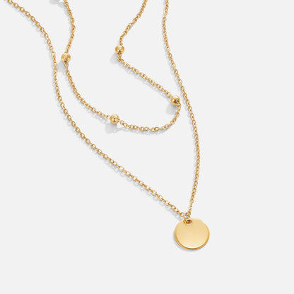 Collar con disco laminado