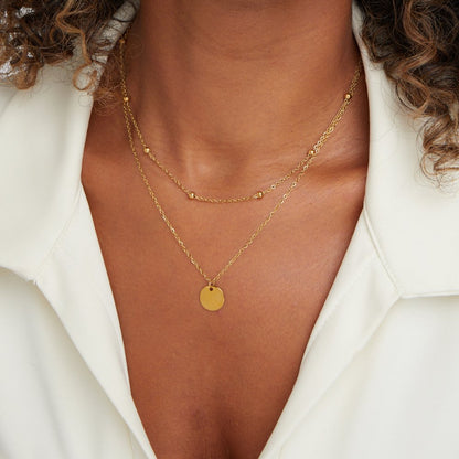 Collar con disco laminado detalle
